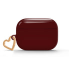Dark Cherry AirPods case with gold-tone heart clip — view 1